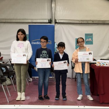 Entrega de premios del II Certamen de Cuentos en la Feria del Libro de Torrelavega